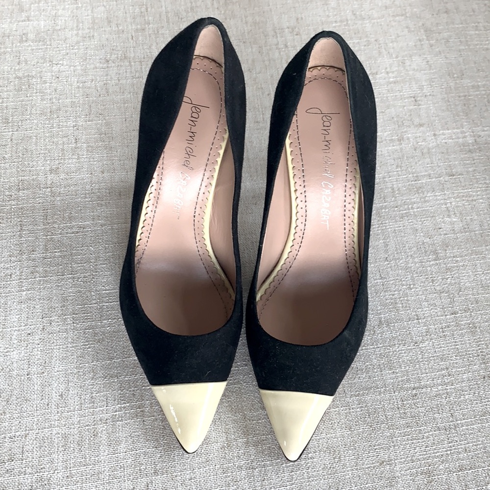 Black suede pumps with white toe